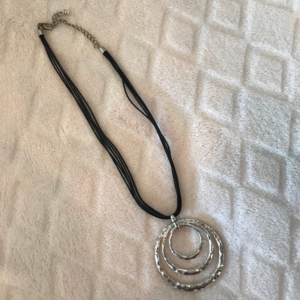 Silver tone pendant